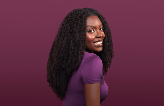 black woman model wearing 4b-4c hair extensions 