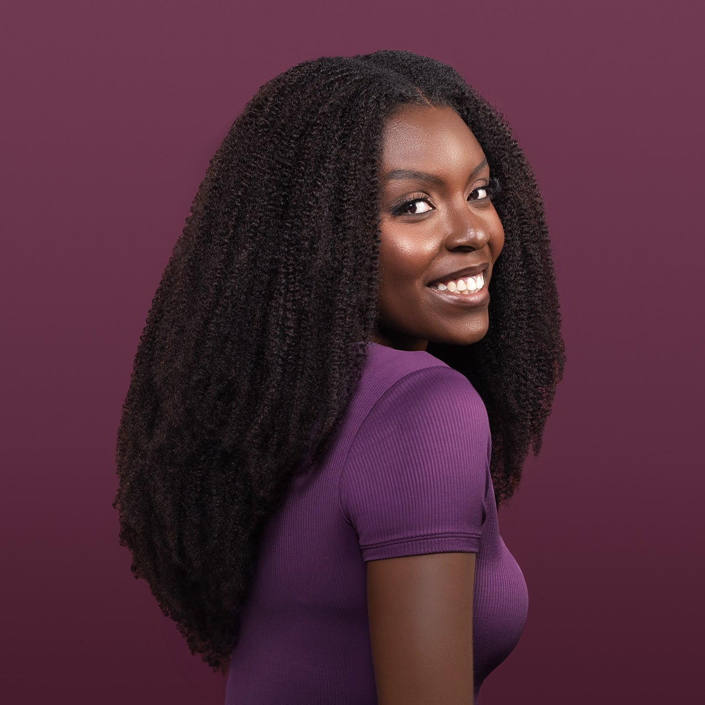 Onye U-Part Wig highlighting tight, springy coils, ideal for achieving bold, textured hairstyles with a seamless blend.