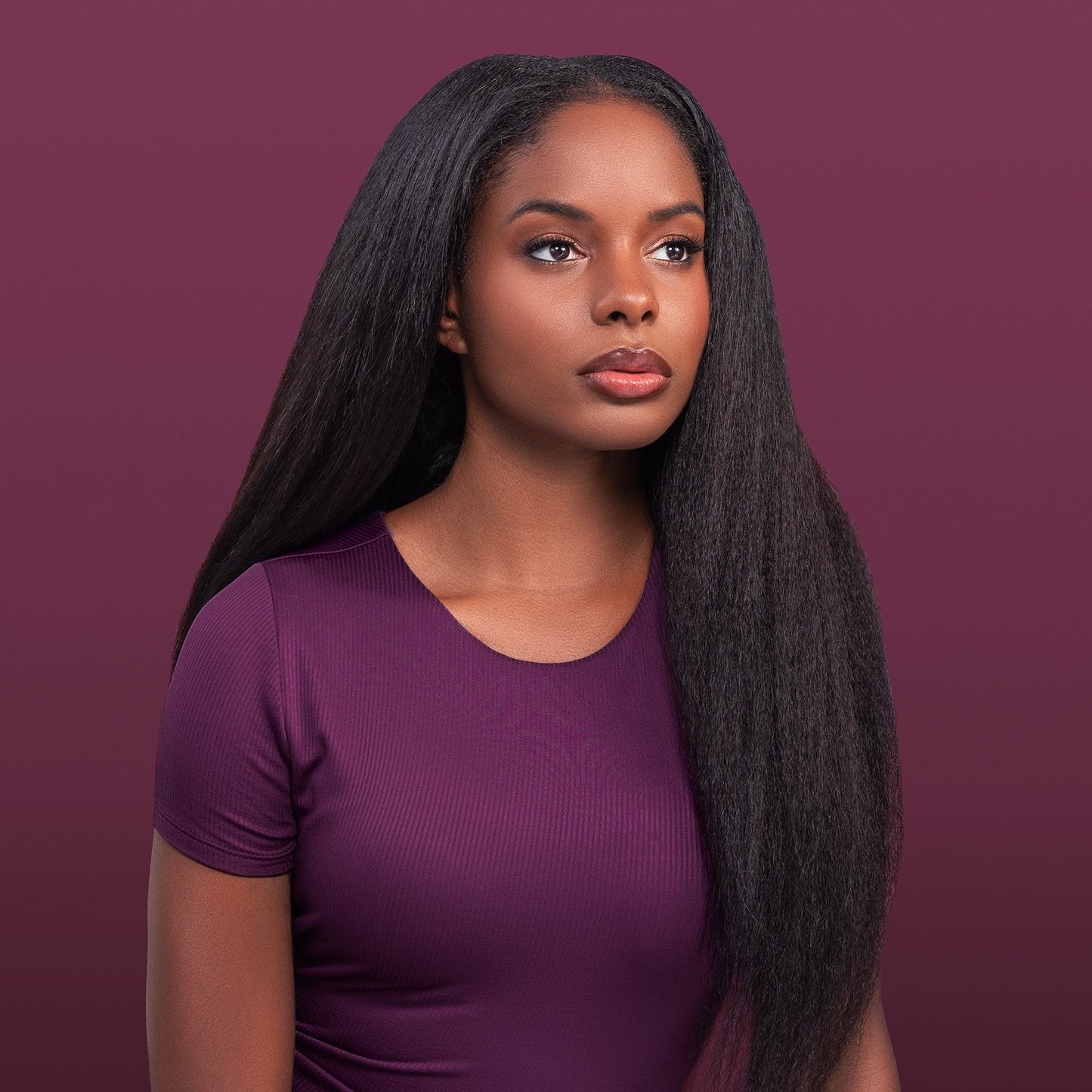 Close-up of the Rani U-Part Wig, highlighting its voluminous kinky blowout texture and seamless blend with natural hair.