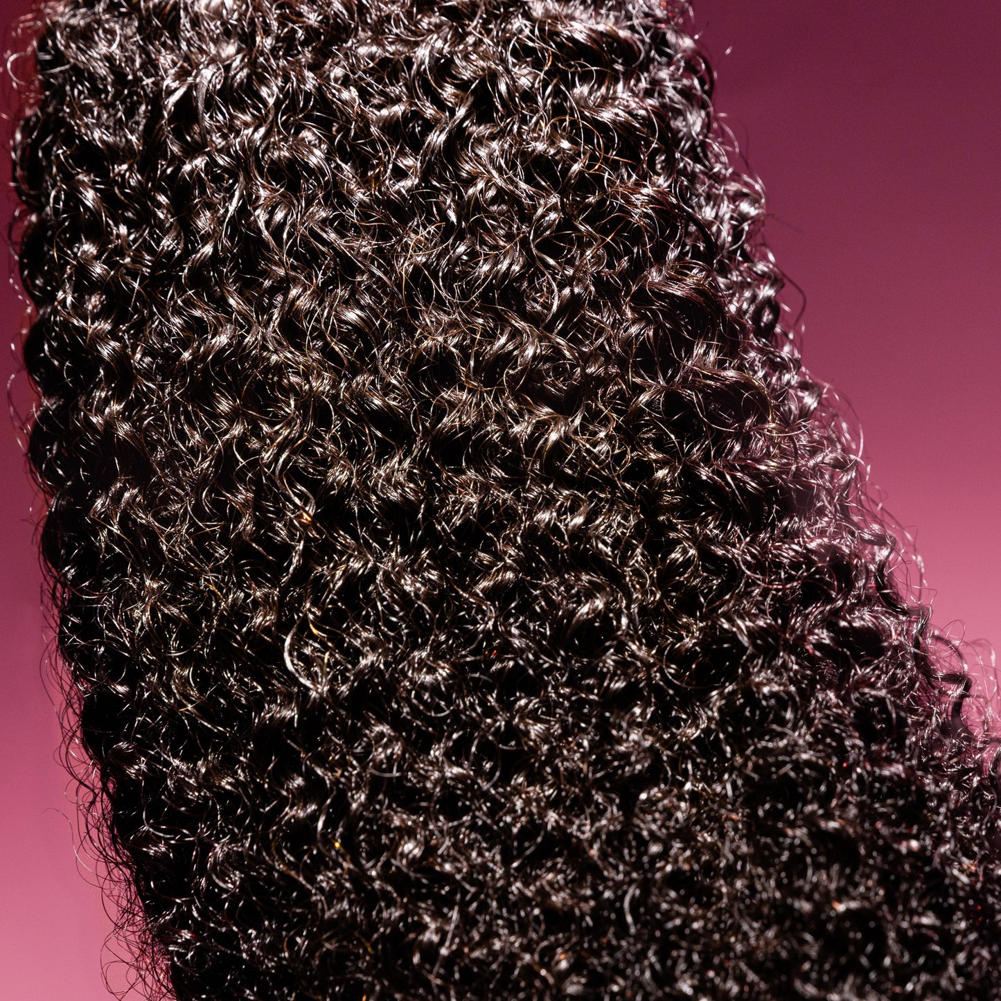 Silva Boundless Bundle featuring premium kinky-coily textured hair extensions with vibrant natural hues, ideal for adding volume and definition to various hairstyles.