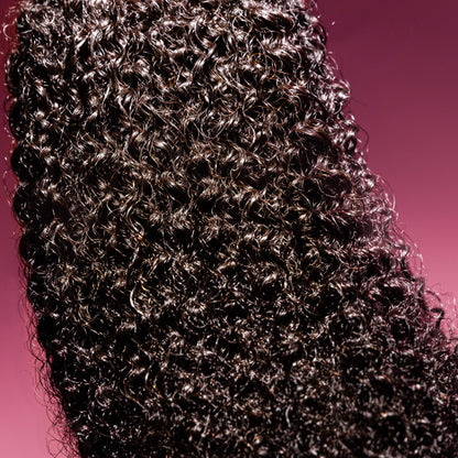 Silva Boundless Bundle featuring premium kinky-coily textured hair extensions with vibrant natural hues, ideal for adding volume and definition to various hairstyles.